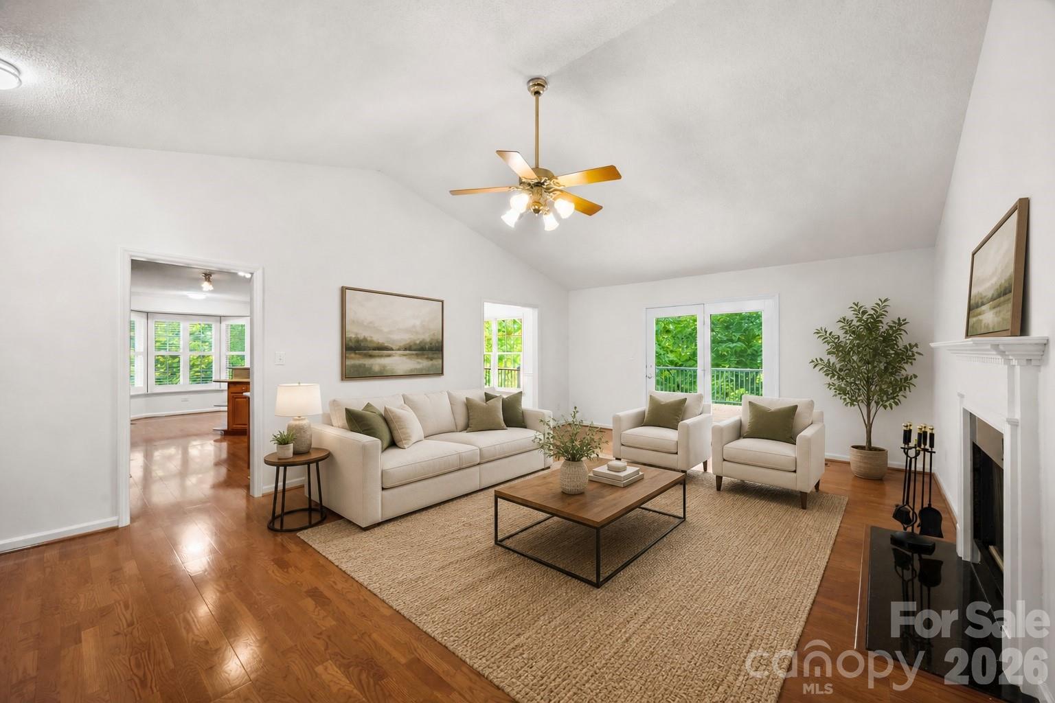 1917 Rucker Road Shelby, NC 28152 - Photo 3 of 41 a living room with furniture a fireplace and a large window