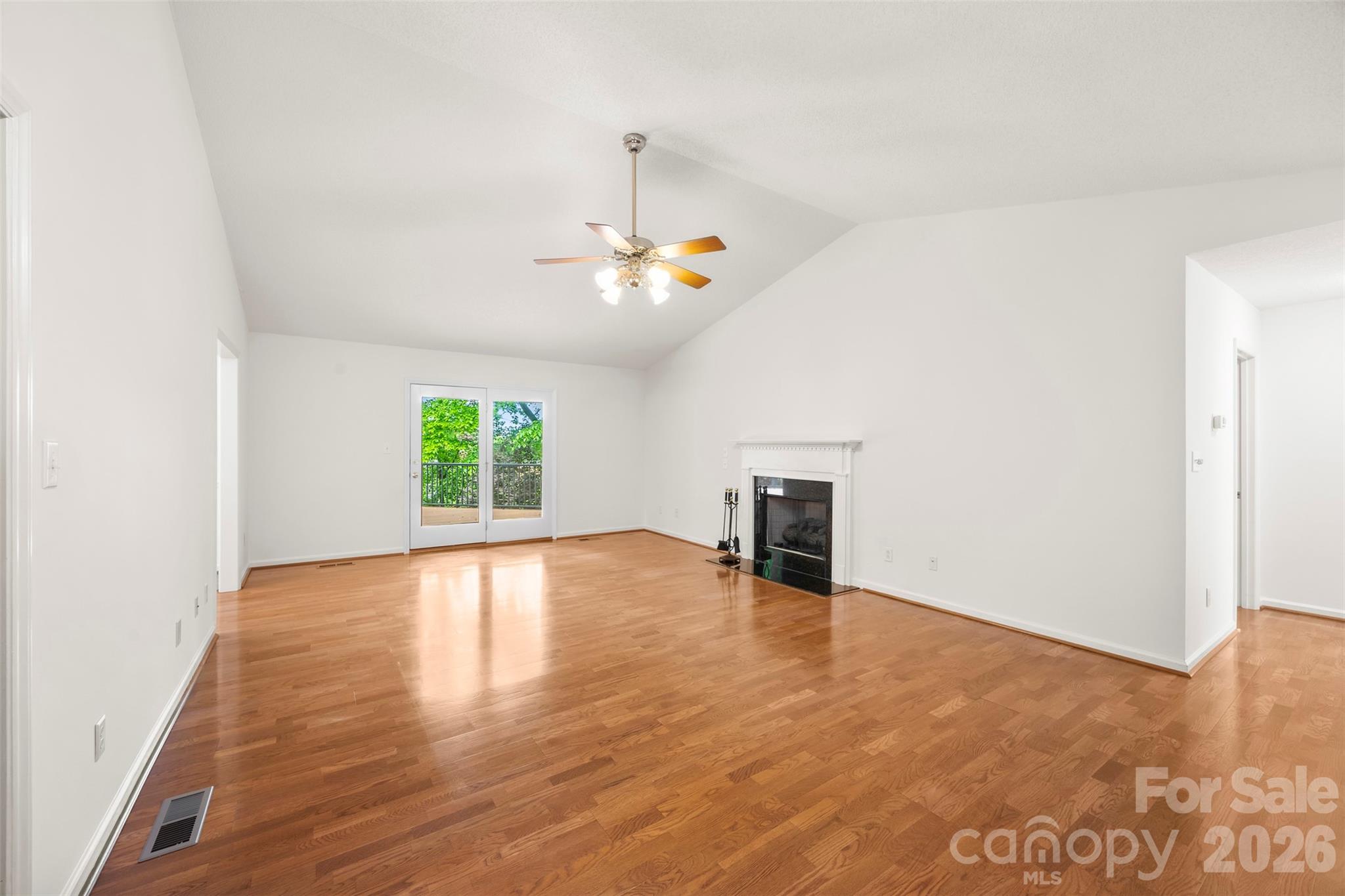 1917 Rucker Road Shelby, NC 28152 - Photo 4 of 41 wooden floor in an empty room with a window