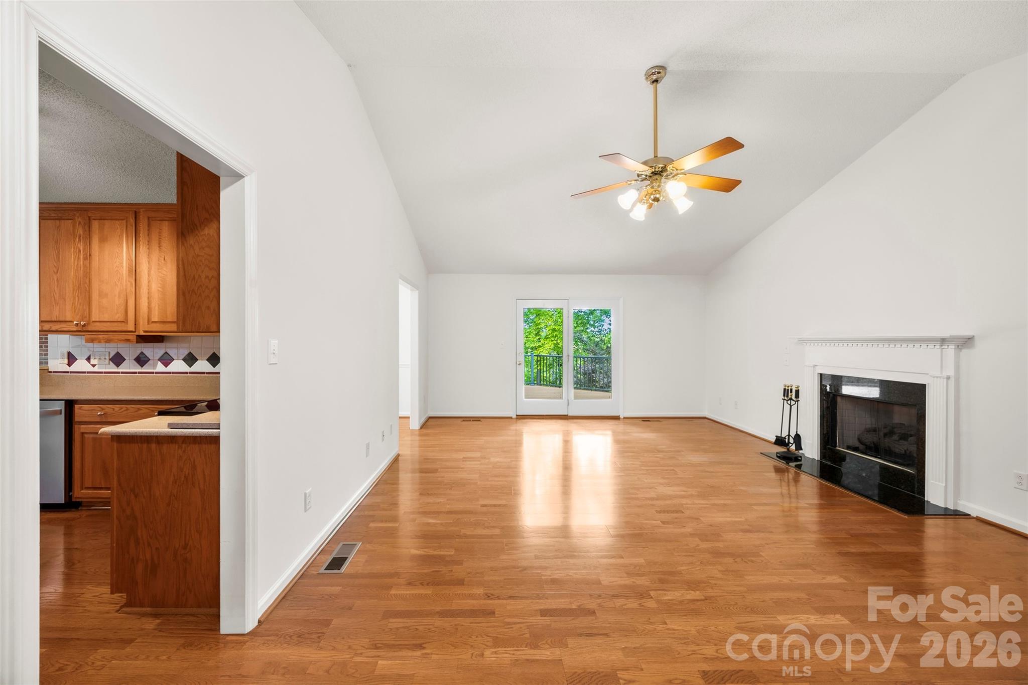 1917 Rucker Road Shelby, NC 28152 - Photo 5 of 41 a view of an empty room with a window and fire place