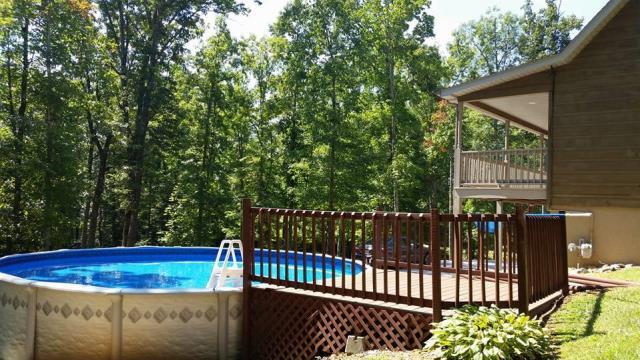 2333 Leatherwood Road Oneida, TN 37841 - Photo 4 of 25 0003_38da593d-f1d6-467a-aaa9-c15531e701d