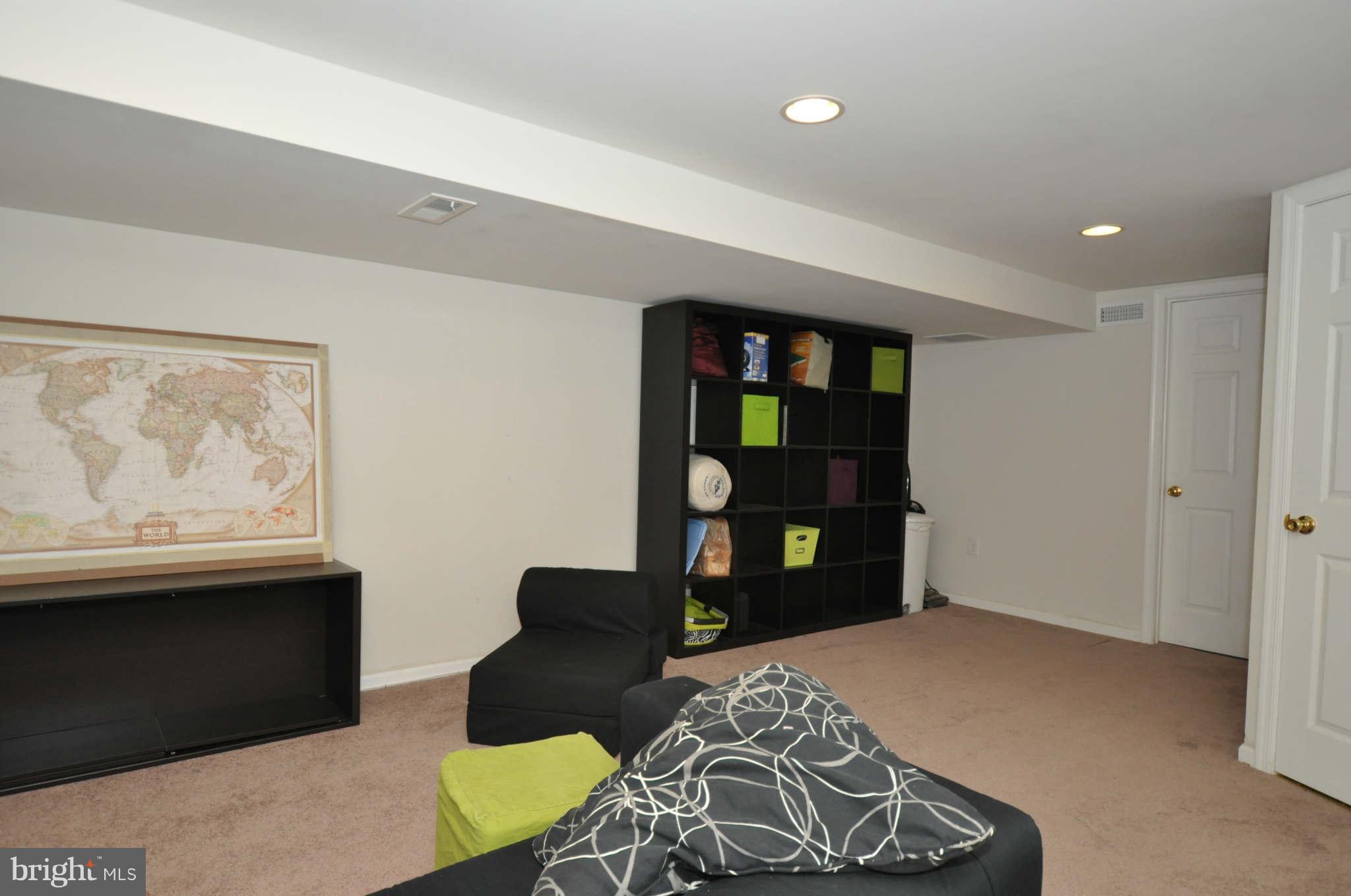 1921 Penhall Road Baltimore, MD 21222 - Photo 15 of 29 a bedroom with a bed and a window