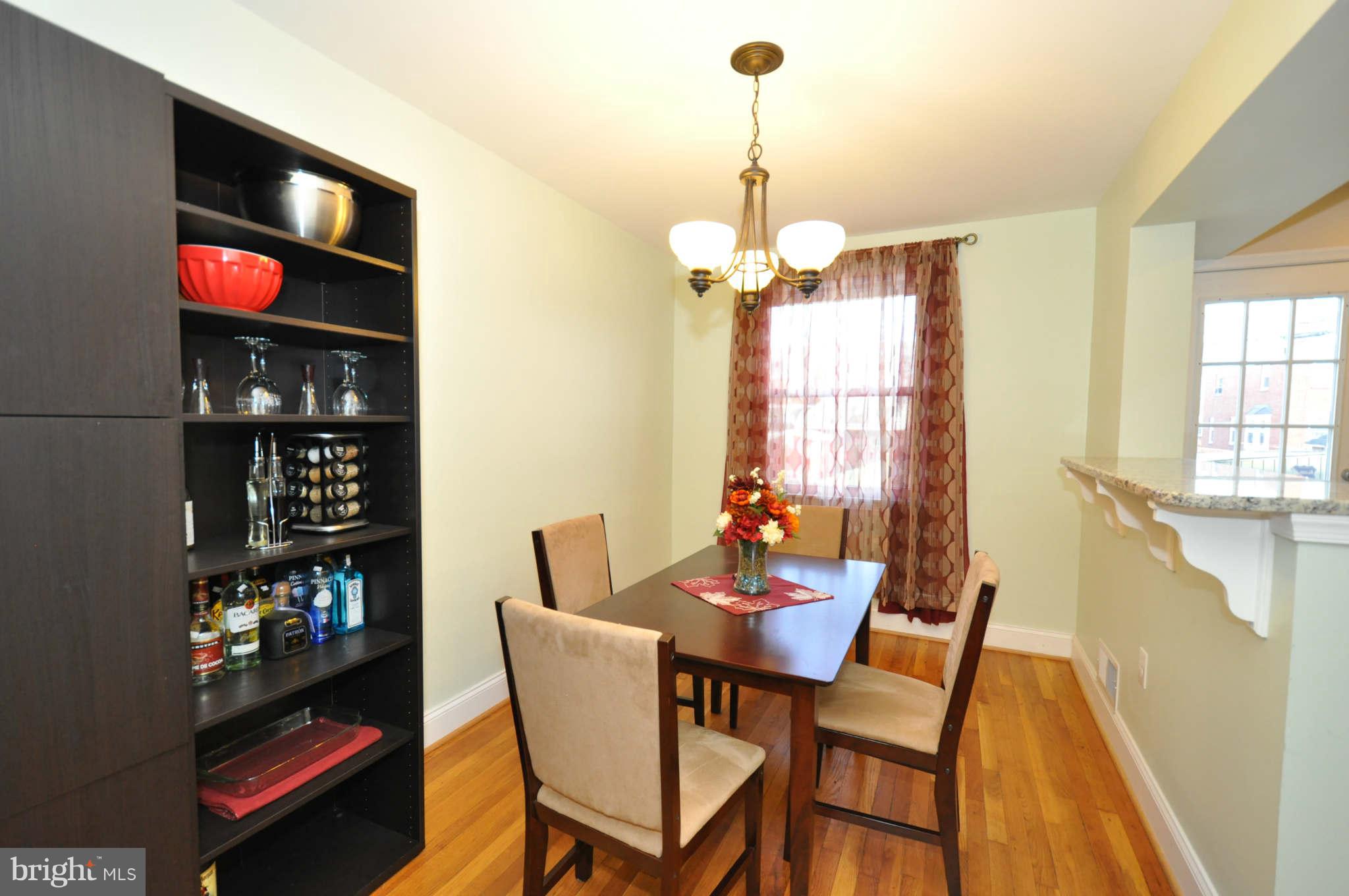 1921 Penhall Road Baltimore, MD 21222 - Photo 8 of 29 a view of a dining room filled with furniture