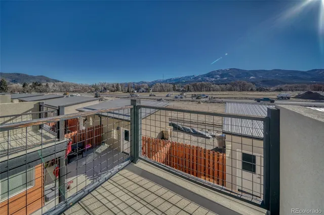 a view of a balcony with city view