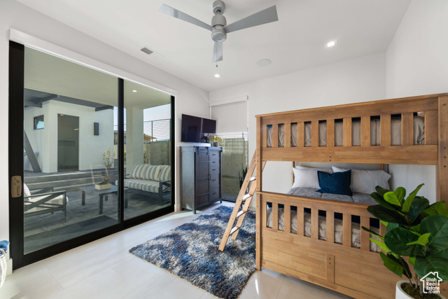 3558 South Cypress Road Hurricane, UT 84737 - Photo 35 of 57 Tiled bedroom with ceiling fan and access to outside