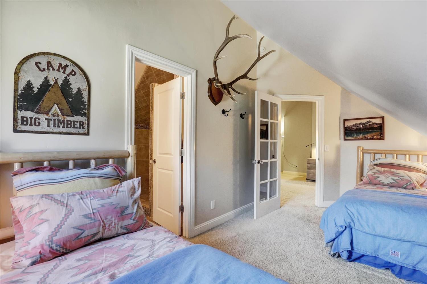 12597 Wolf Road Grass Valley, CA 95949 - Photo 43 of 88 Darling room with angled dormer ceilings