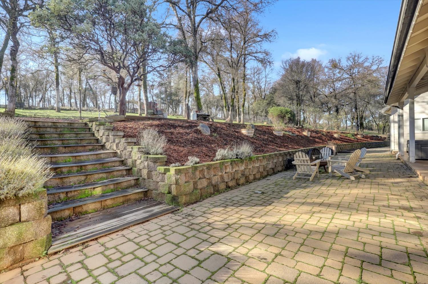 12597 Wolf Road Grass Valley, CA 95949 - Photo 63 of 88 Low maintenance terraced back yard with paved patio
