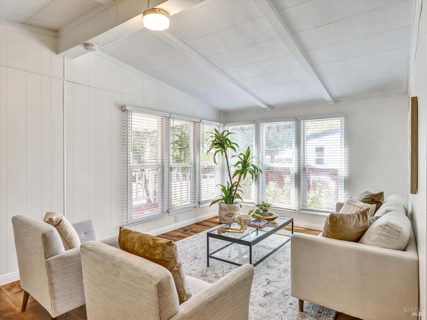 353 Yosemite Road San Rafael, CA 94903 - Photo 1 of 1 a living room with furniture and a large window