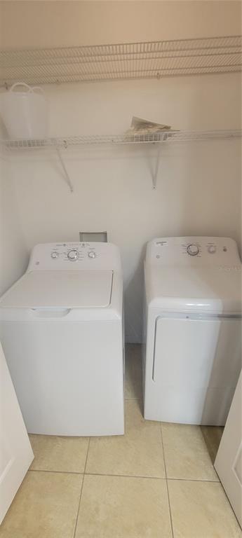 10951 Brickside Court Riverview, FL 33579 - Photo 12 of 31 a utility room with a washer and dryer