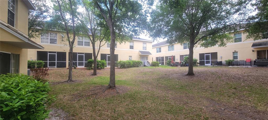 10951 Brickside Court Riverview, FL 33579 - Photo 16 of 31 a view of a house with a backyard