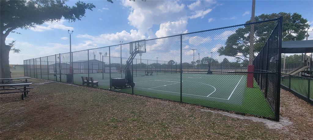 10951 Brickside Court Riverview, FL 33579 - Photo 20 of 31 a green field with fence