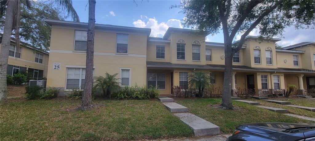 10951 Brickside Court Riverview, FL 33579 - Photo 2 of 31 a front view of a house with garden