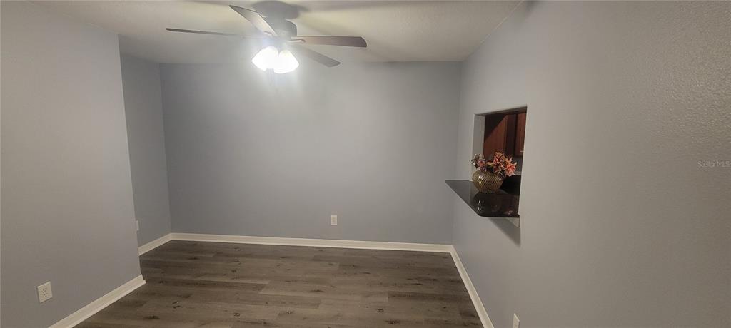 10951 Brickside Court Riverview, FL 33579 - Photo 3 of 31 an empty room with a door