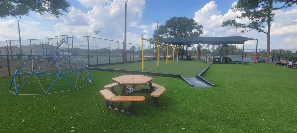 10951 Brickside Court Riverview, FL 33579 - Photo 31 of 31 a view of a backyard with a slide