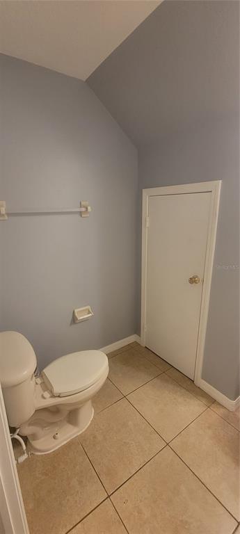 10951 Brickside Court Riverview, FL 33579 - Photo 6 of 31 a bathroom with a toilet
