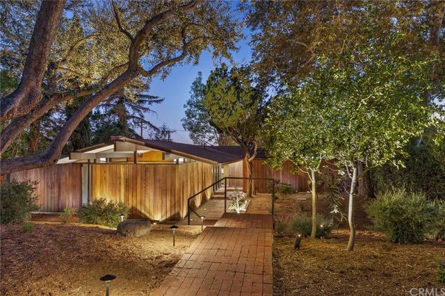a view of backyard with green space