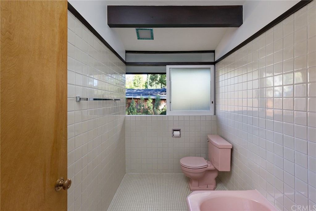 700 Edgeview Drive Sierra Madre, CA 91024 - Photo 16 of 32 a bathroom with a toilet and a shower