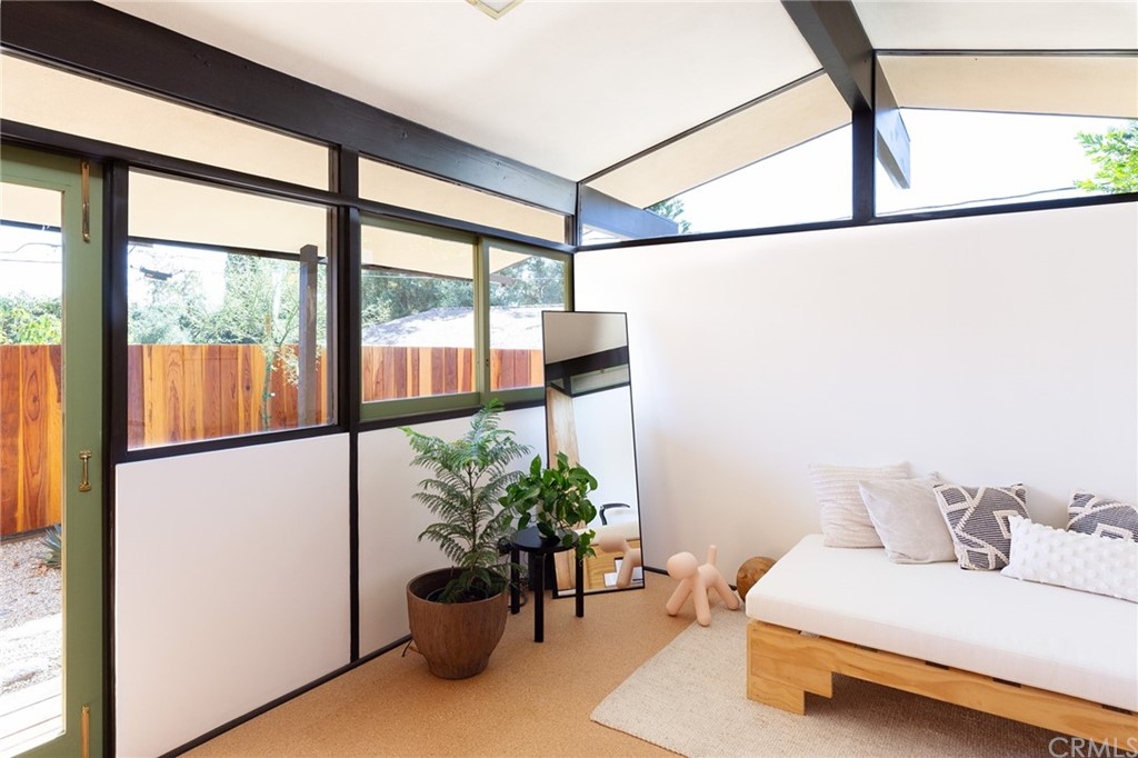 700 Edgeview Drive Sierra Madre, CA 91024 - Photo 23 of 32 a living room with furniture and a potted plant