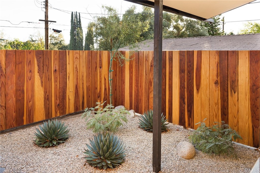 700 Edgeview Drive Sierra Madre, CA 91024 - Photo 27 of 32 a view of a backyard with potted plants