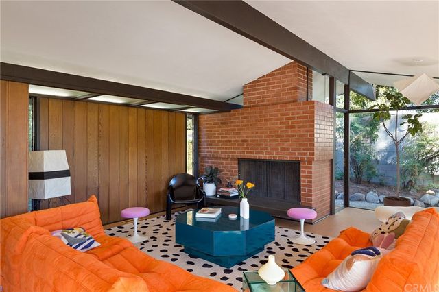 a bathroom with a double vanity sink mirror and shower