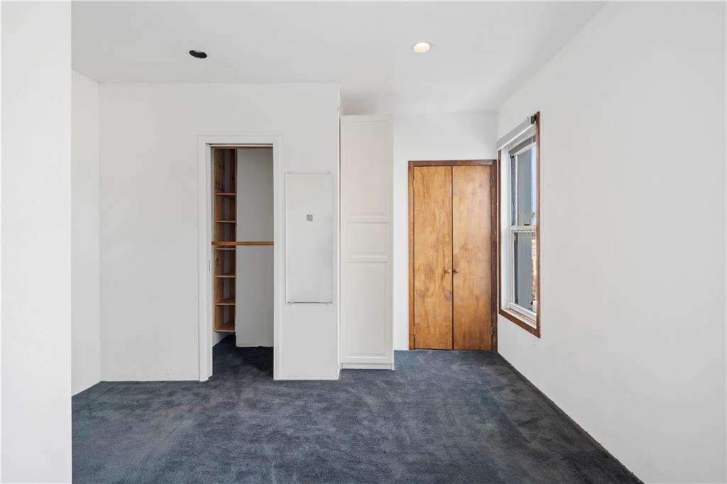 457 44th Street Brooklyn, NY 11220 - Photo 14 of 16 an empty room with closet