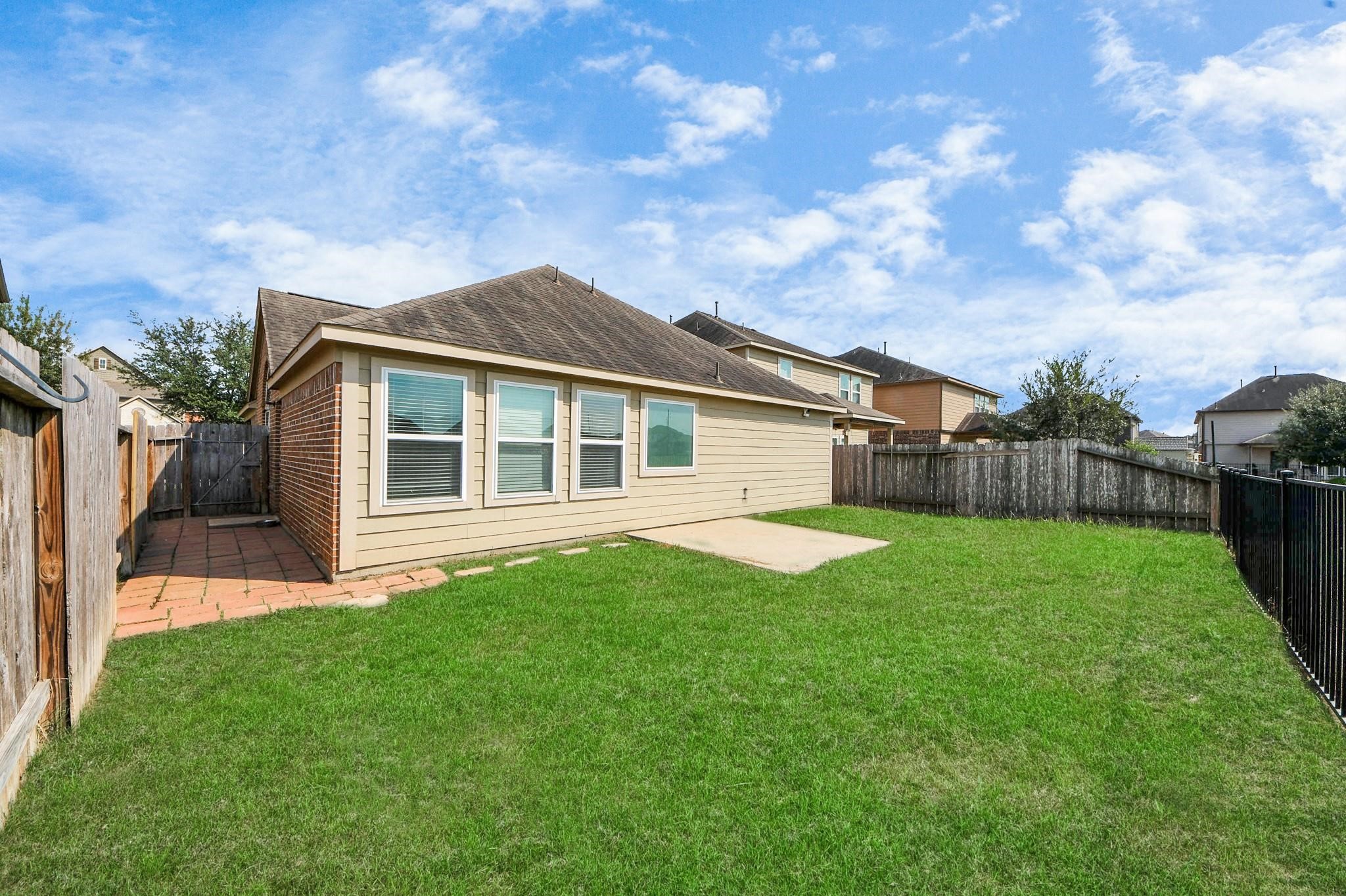 15003 Signal Ridge Way Cypress, TX 77429 - Photo 36 of 40 a view of a house with a big yard plants and large tree