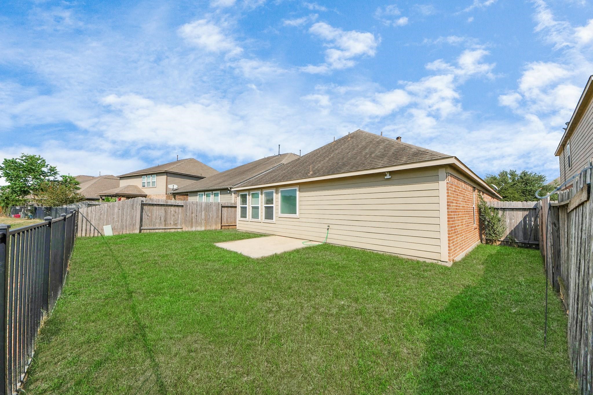 15003 Signal Ridge Way Cypress, TX 77429 - Photo 37 of 40 a view of a house with backyard and garden