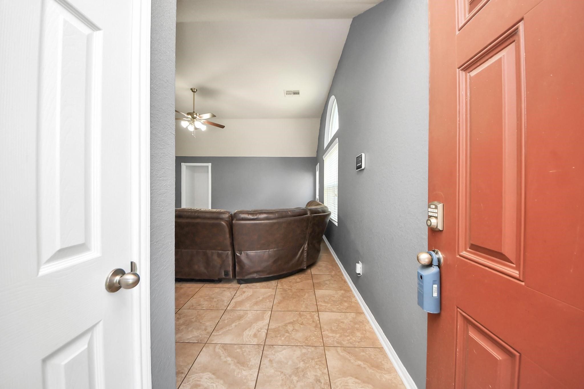 15003 Signal Ridge Way Cypress, TX 77429 - Photo 6 of 40 a living room with furniture and a rug