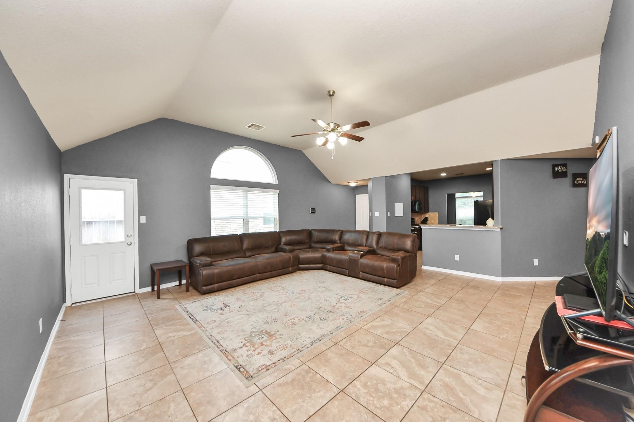 15003 Signal Ridge Way Cypress, TX 77429 - Photo 9 of 40 a bedroom with a large bed and a window