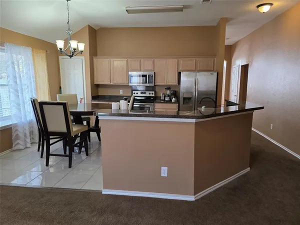 a view of a backyard with a garden