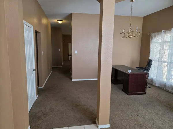 a view of a hallway with closet