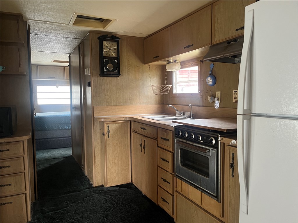 7945 Lake Road, Unit 34 Sodus, NY 14555 - Photo 17 of 24 EASY TO WORK IN KITCHEN! (OR JUST ORDER OUT!)