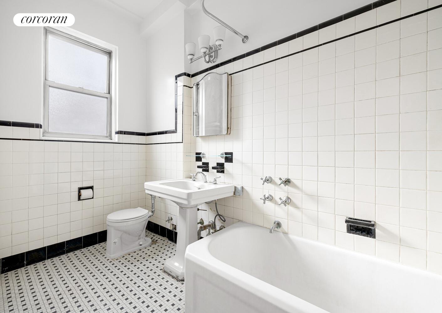 318 West 100th Street, Unit 7D Manhattan, NY 10025 - Photo 14 of 17 a bathroom with a sink a toilet and shower