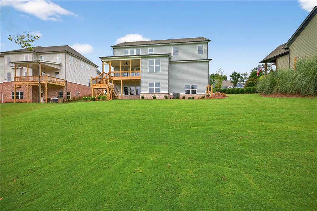 3787 Cheyenne Lane Jefferson, GA 30549 - Photo 60 of 82 a front view of house with yard and green space