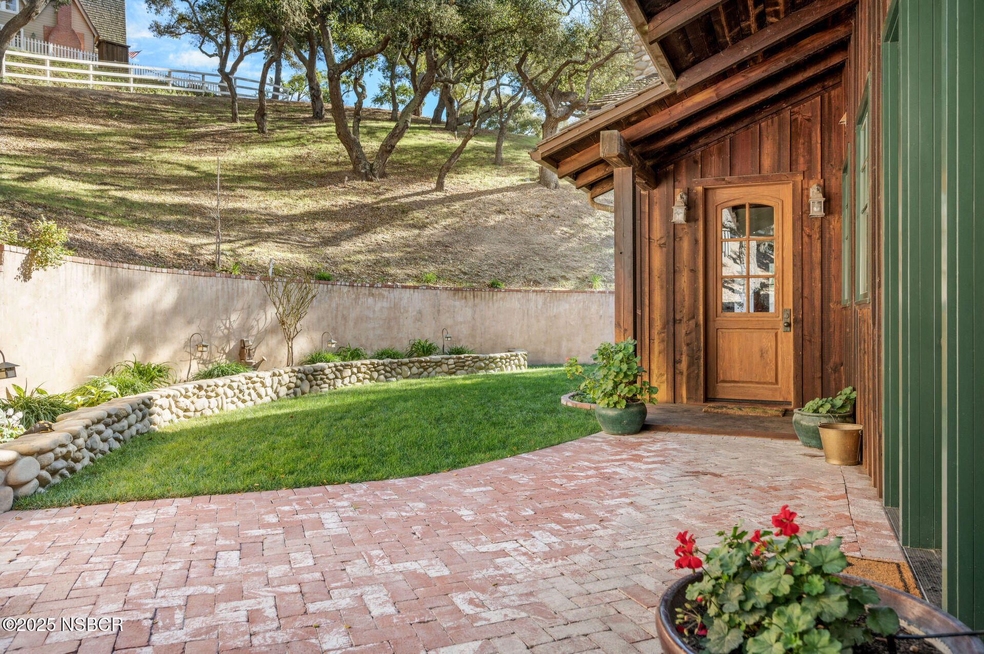 4086 East Oak Trail Road Santa Ynez, CA 93460 - Photo 29 of 57 a view of a pathway of a house with a yard