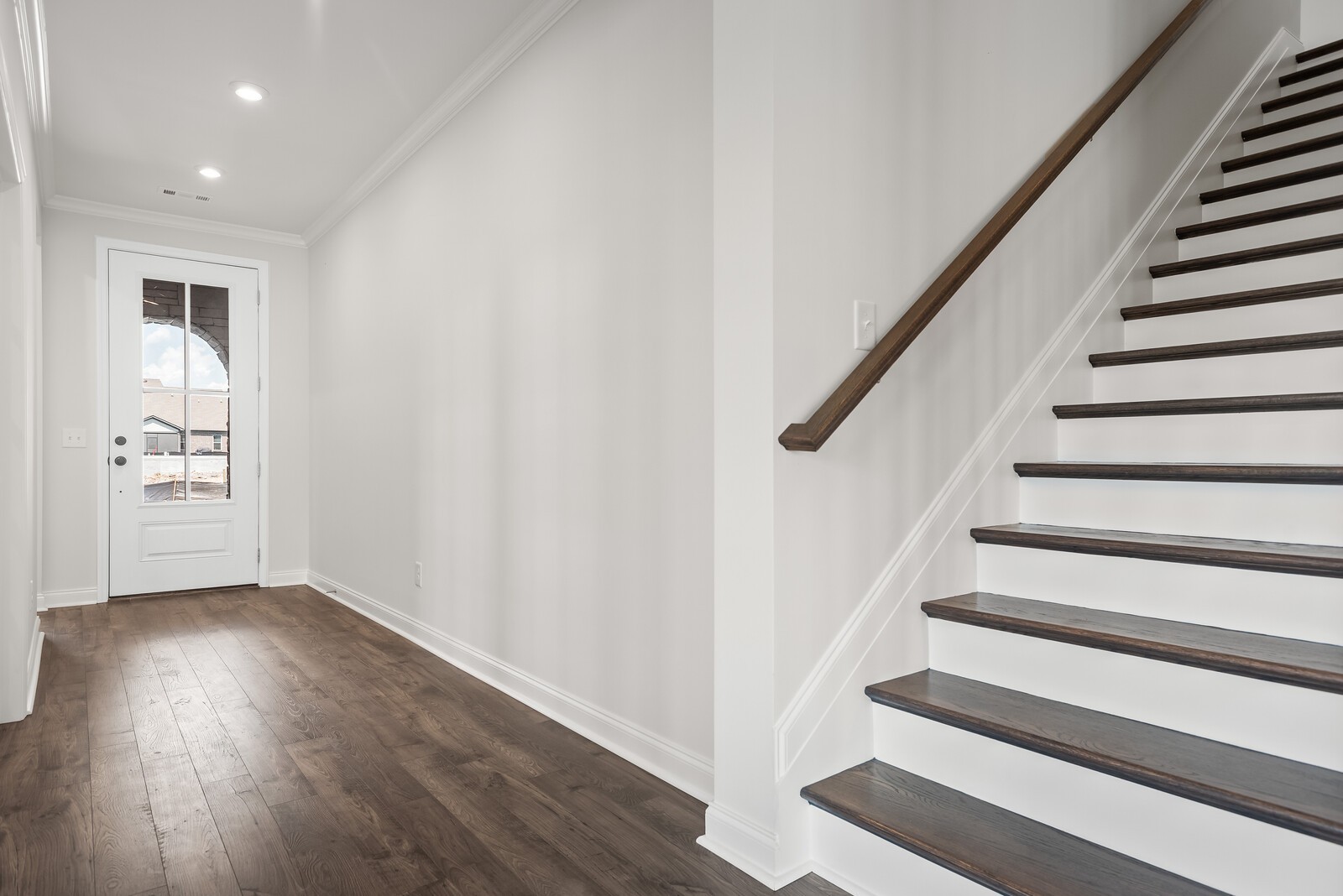 7108 Comstock Road Spring Hill, TN 37174 - Photo 11 of 70 a view of entryway with wooden floor