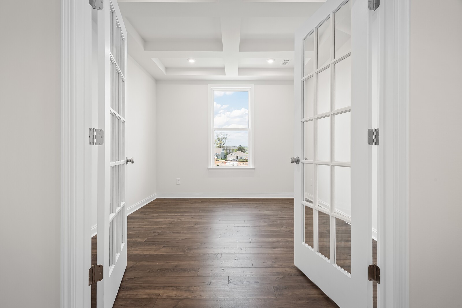 7108 Comstock Road Spring Hill, TN 37174 - Photo 15 of 70 a view of an entryway with wooden floor and windows
