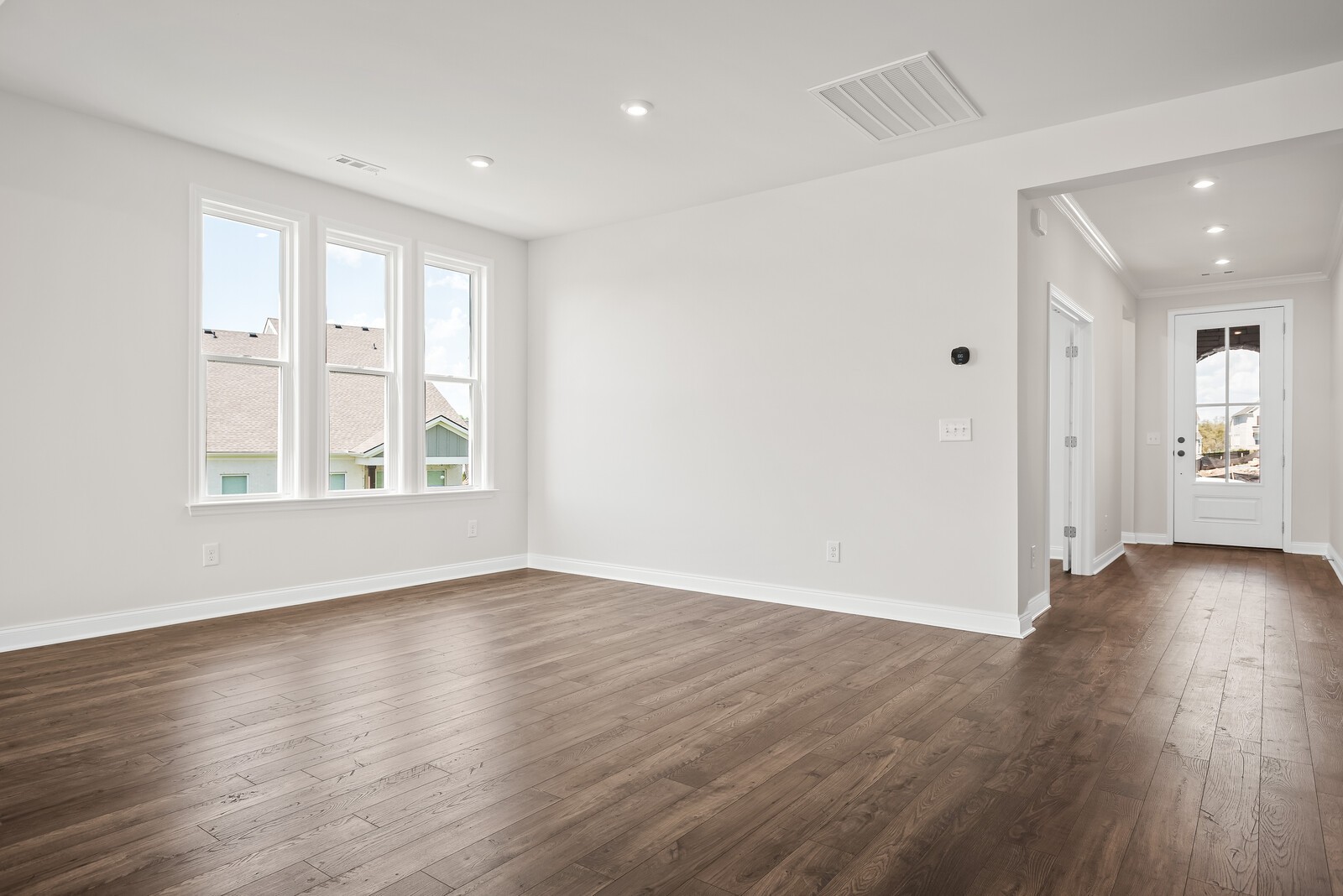 7108 Comstock Road Spring Hill, TN 37174 - Photo 20 of 70 an empty room with wooden floor and windows