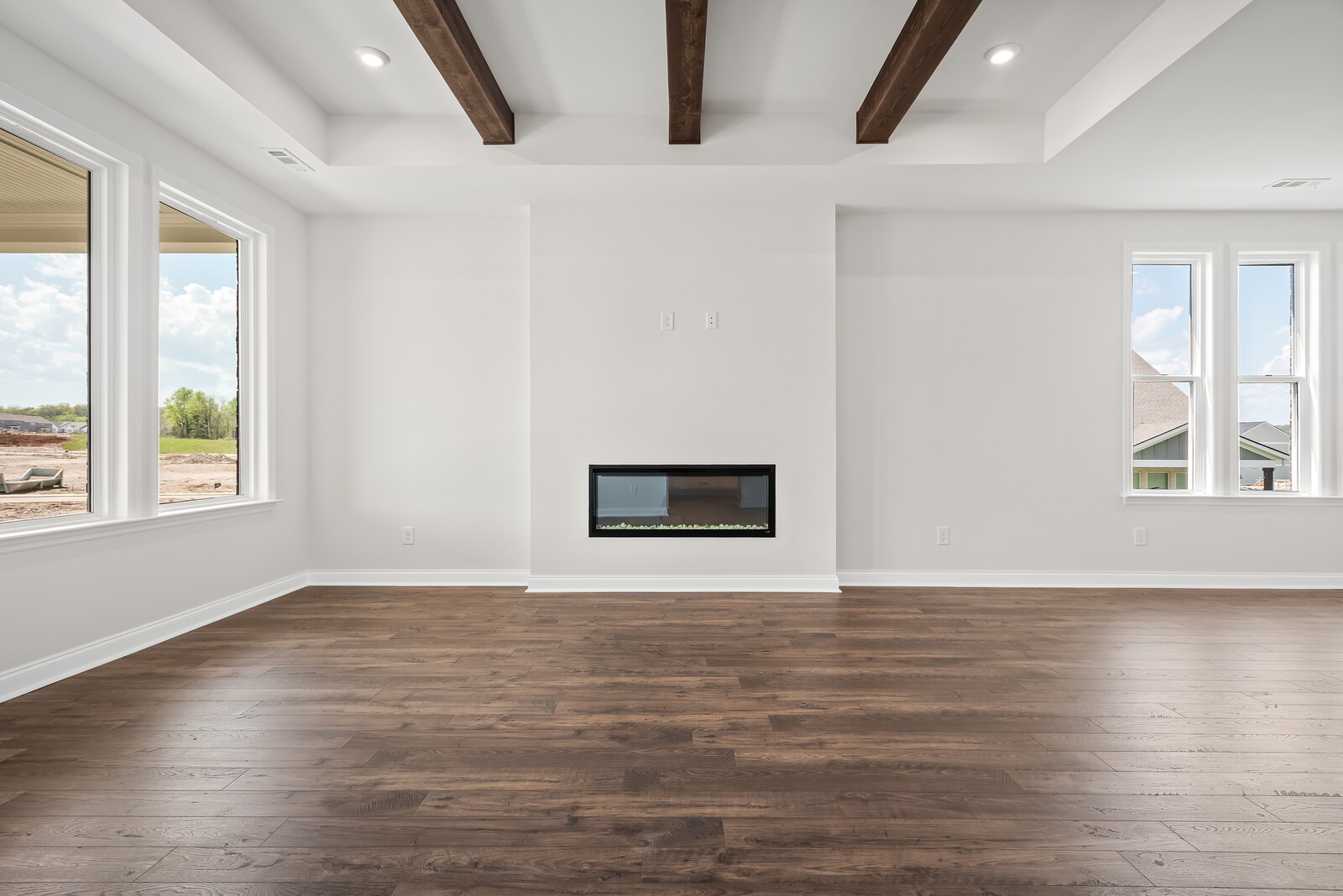 7108 Comstock Road Spring Hill, TN 37174 - Photo 22 of 70 a view of an empty room with window and wooden floor