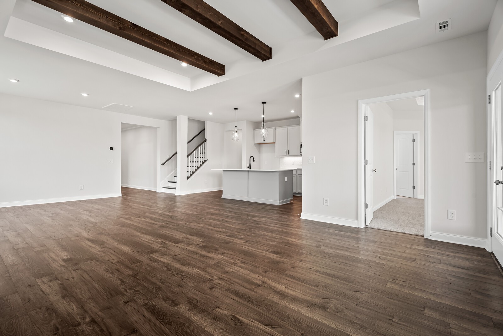 7108 Comstock Road Spring Hill, TN 37174 - Photo 24 of 70 a view of a room with wooden floor and staircase