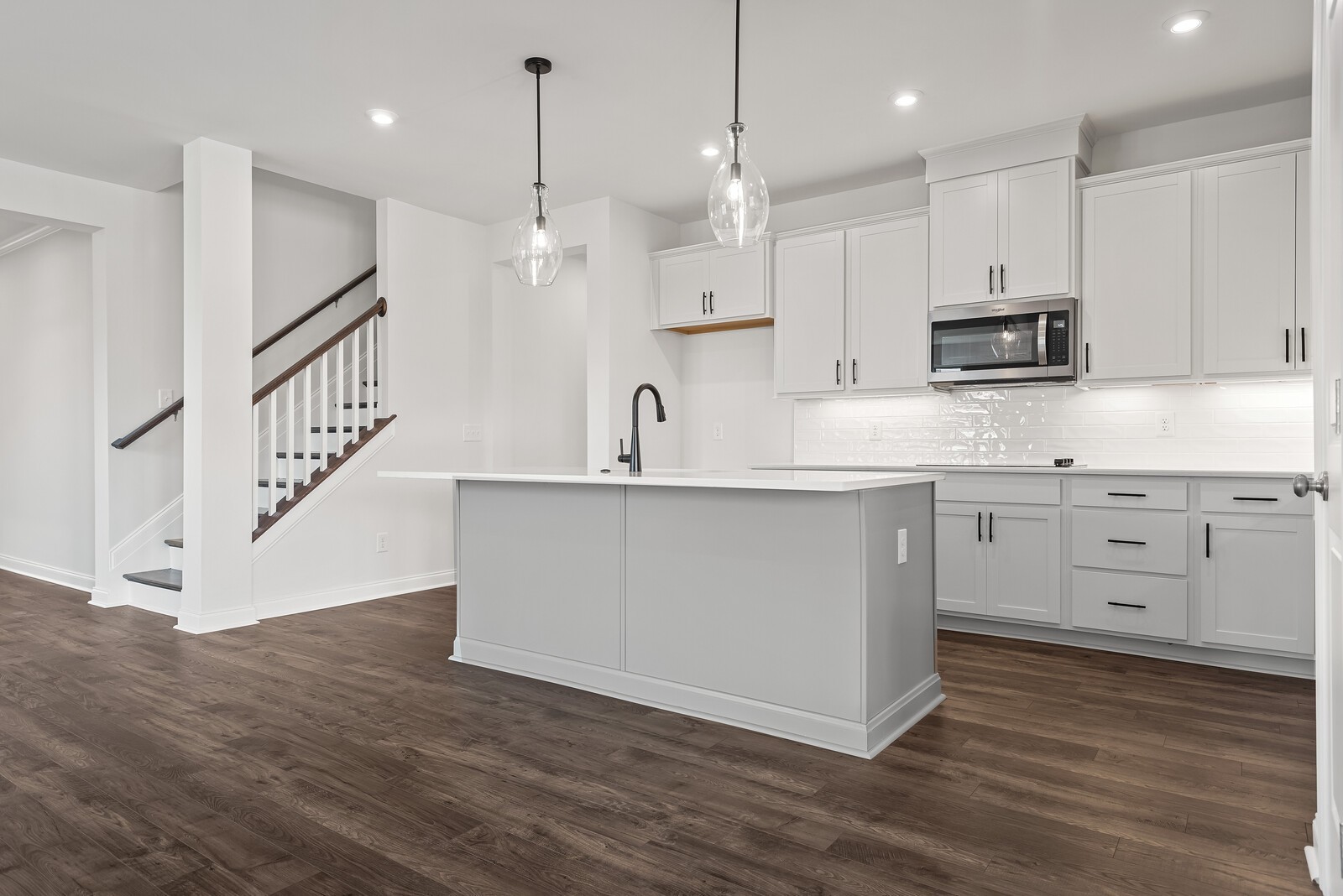 7108 Comstock Road Spring Hill, TN 37174 - Photo 25 of 70 a kitchen with stainless steel appliances granite countertop a stove a sink and a refrigerator