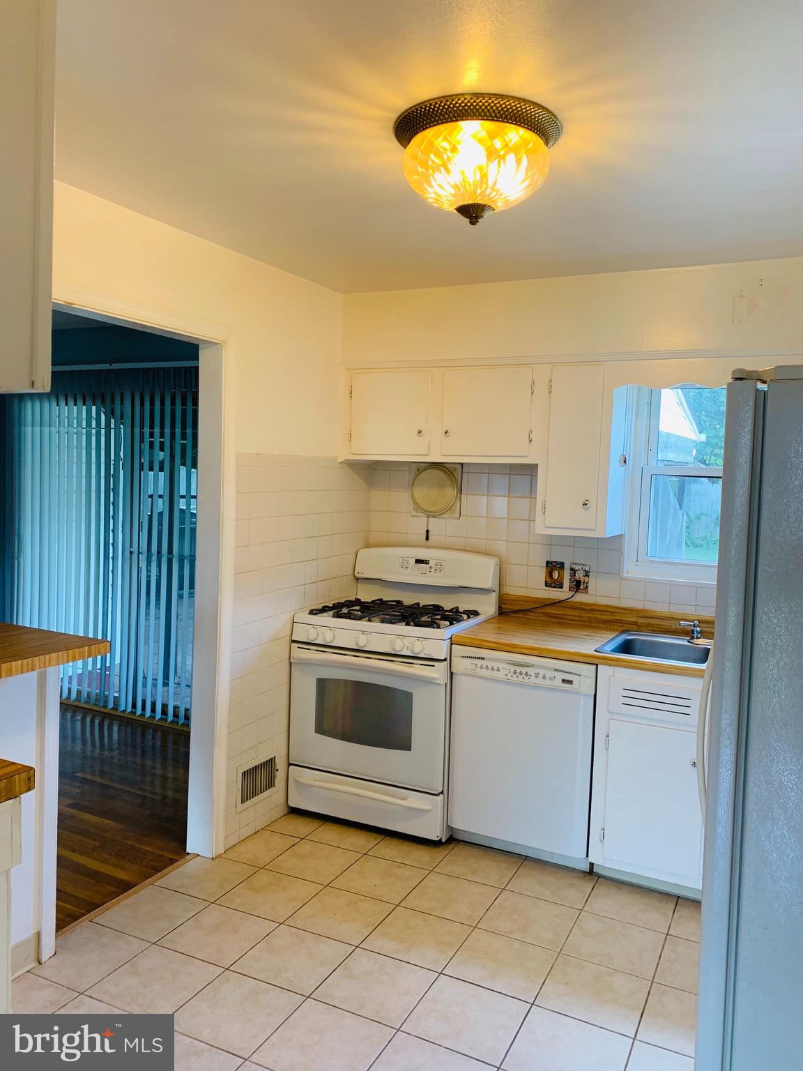 5902 Flanders Street Springfield, VA 22150 - Photo 11 of 45 Ceramic tile floors in kitchen.
