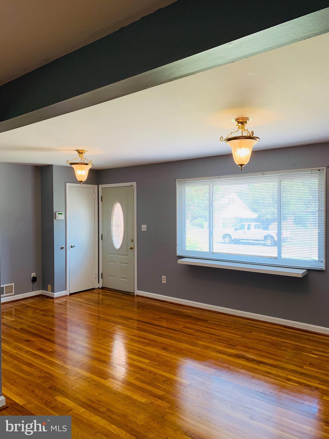 5902 Flanders Street Springfield, VA 22150 - Photo 4 of 45 Beautiful hardwood floors in the main level LR.