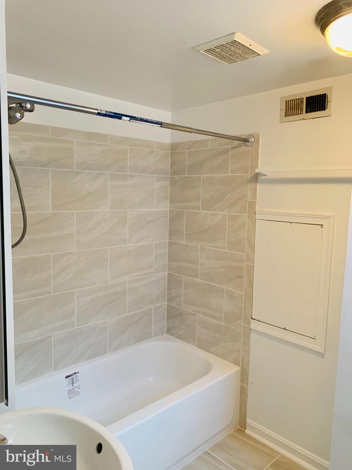 5902 Flanders Street Springfield, VA 22150 - Photo 33 of 45 Brand new lower level hall bathroom.