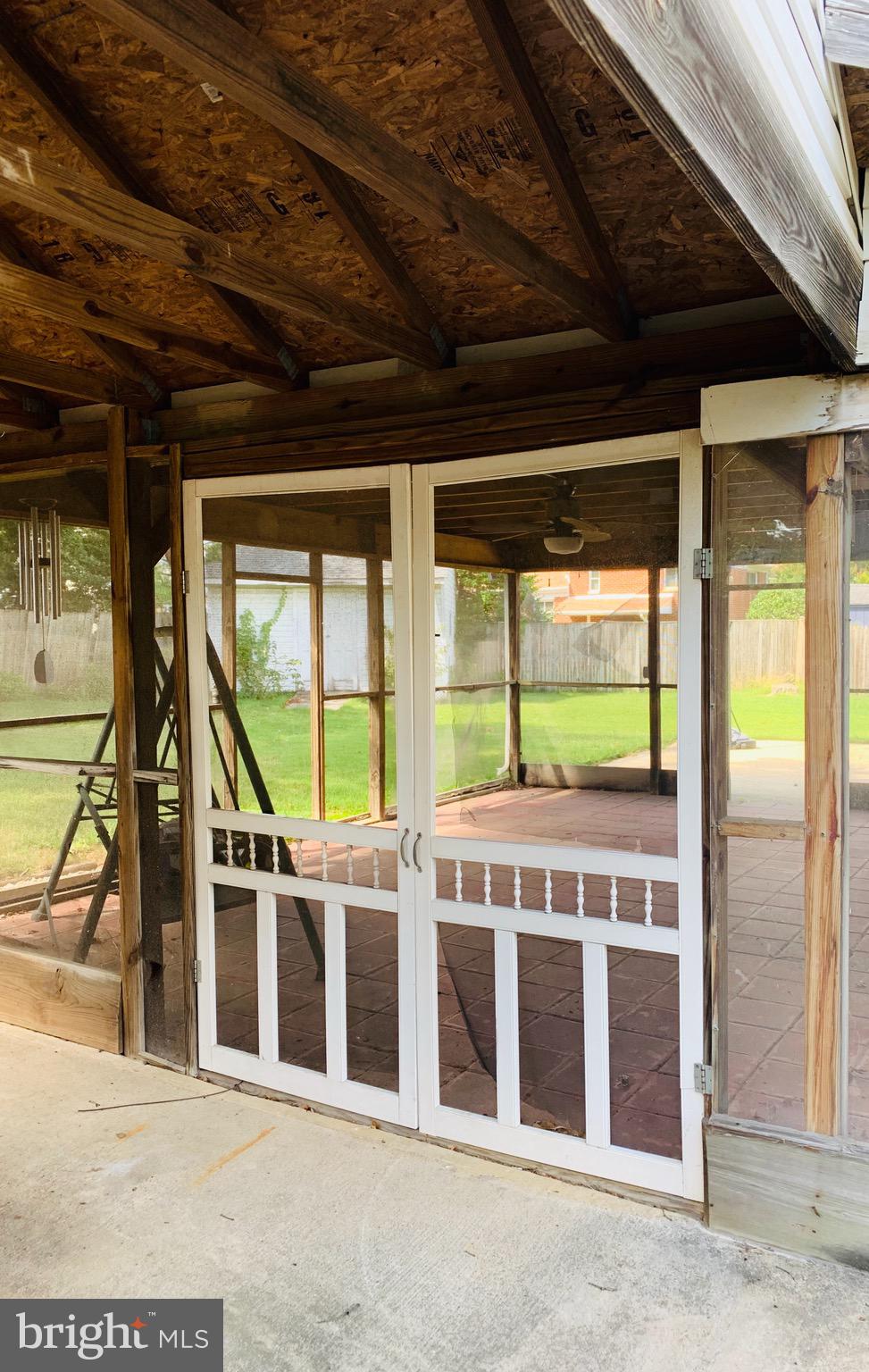 5902 Flanders Street Springfield, VA 22150 - Photo 38 of 45 Exterior screened in porch entrance off car port.