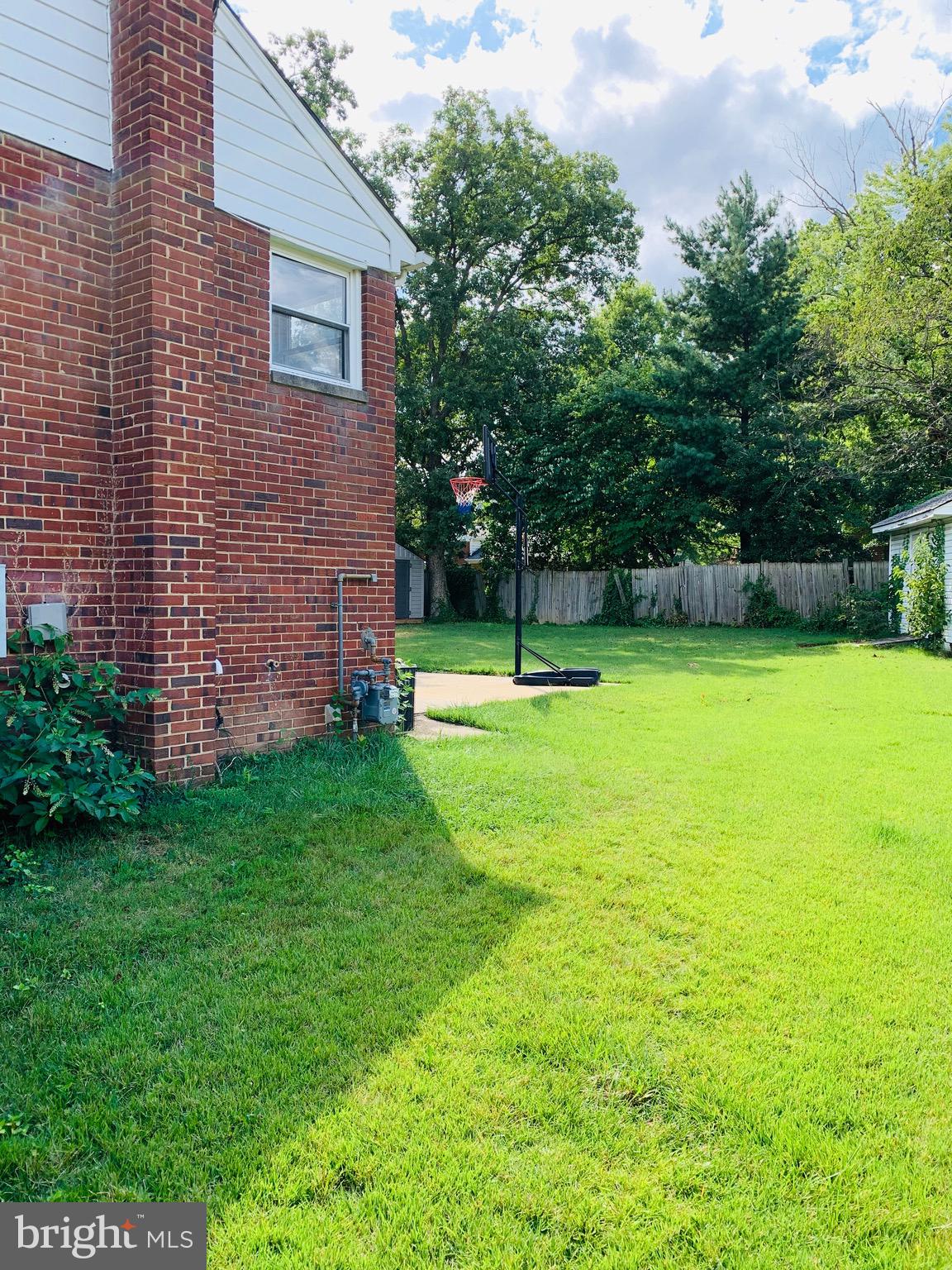5902 Flanders Street Springfield, VA 22150 - Photo 39 of 45 Exterior side view of the home.