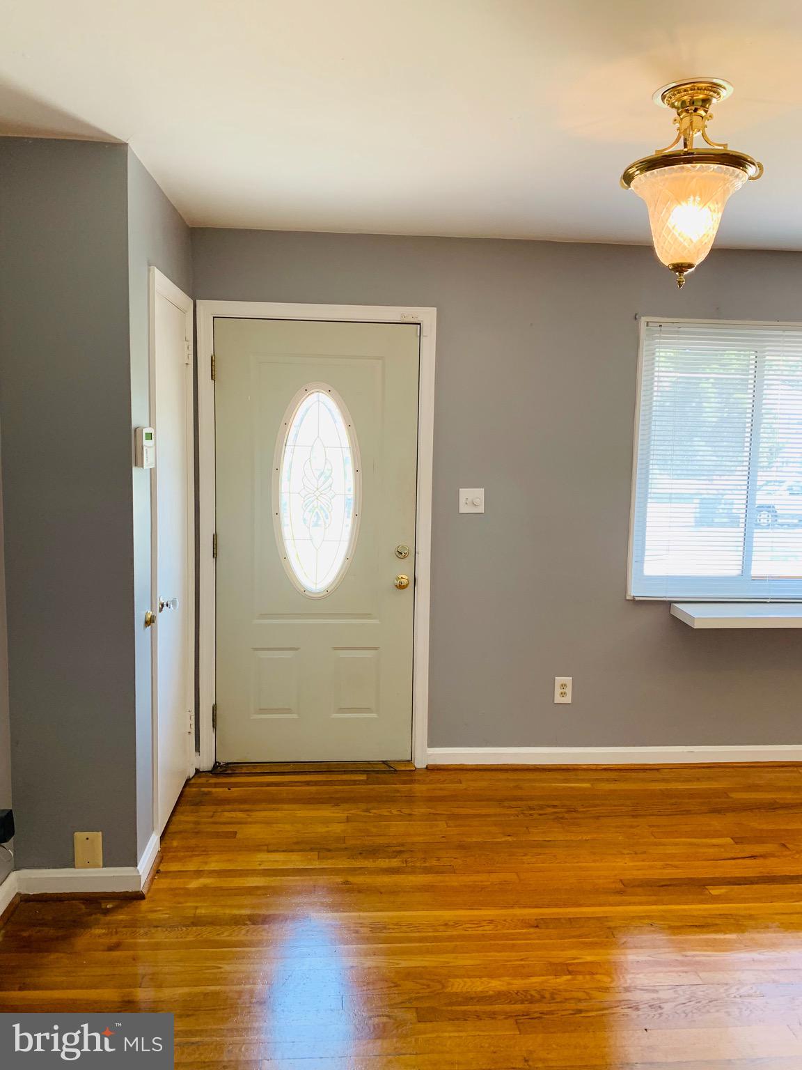 5902 Flanders Street Springfield, VA 22150 - Photo 7 of 45 Front entrance leads into Living Room.