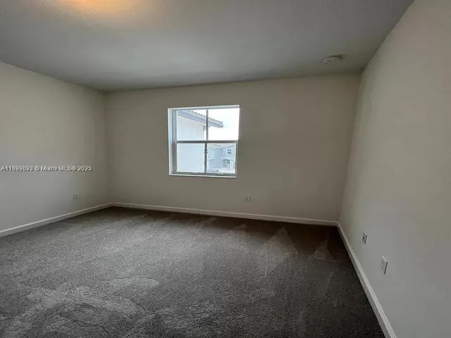 a bathroom with a double vanity sink mirror and toilet