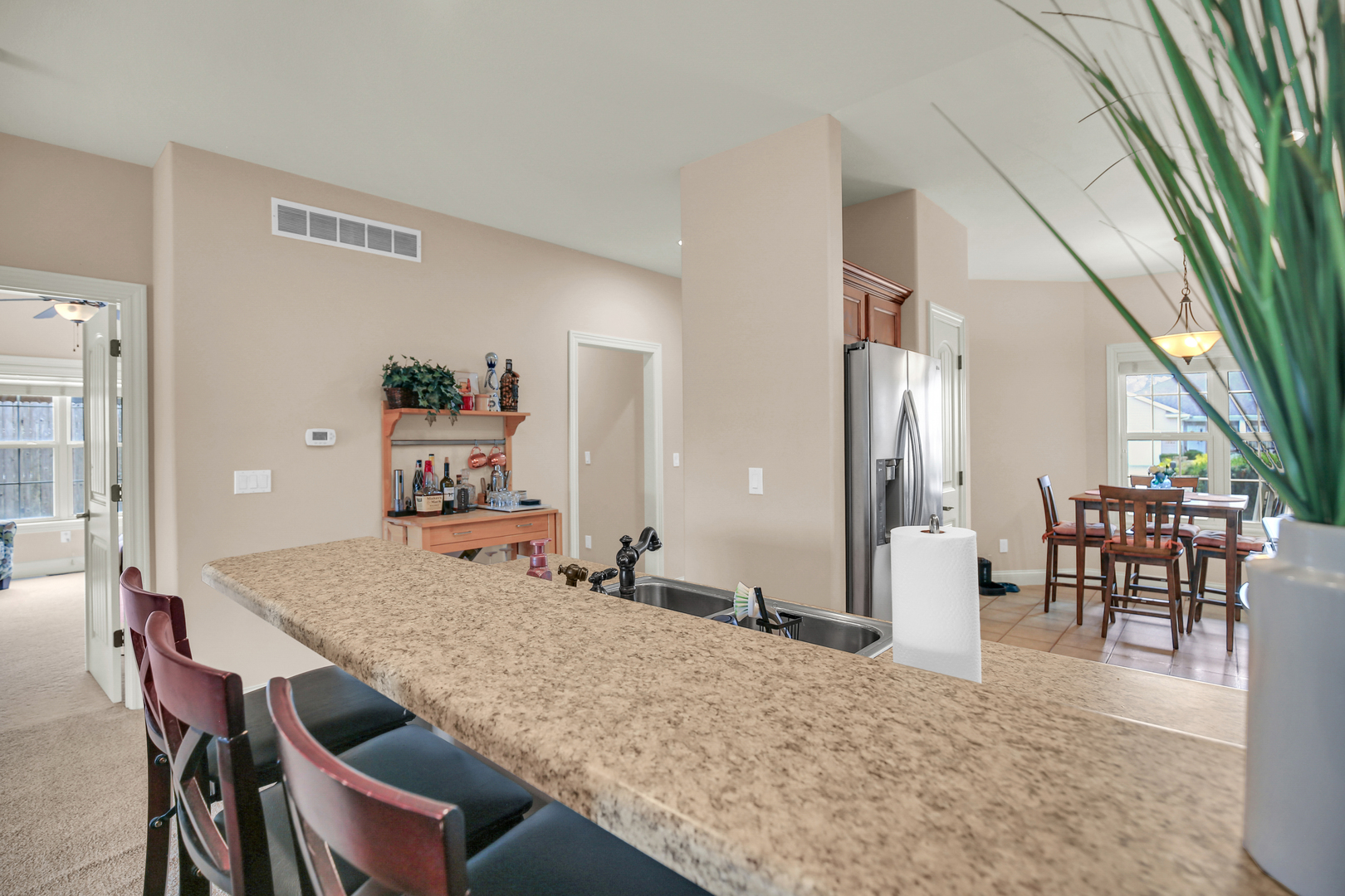 1504 Stonebluff Court, Unit 1504 Champaign, IL 61822 - Photo 14 of 40 a view of a dining room with furniture