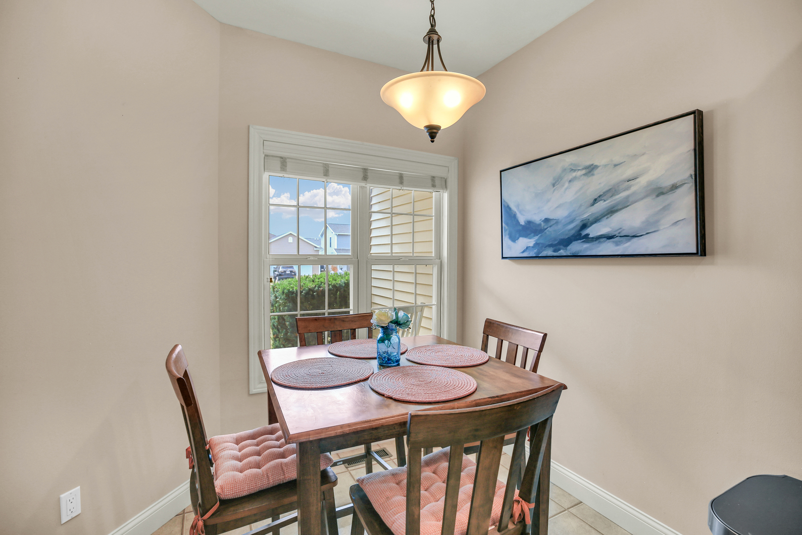 1504 Stonebluff Court, Unit 1504 Champaign, IL 61822 - Photo 19 of 40 a view of a dining room with furniture window and outside view