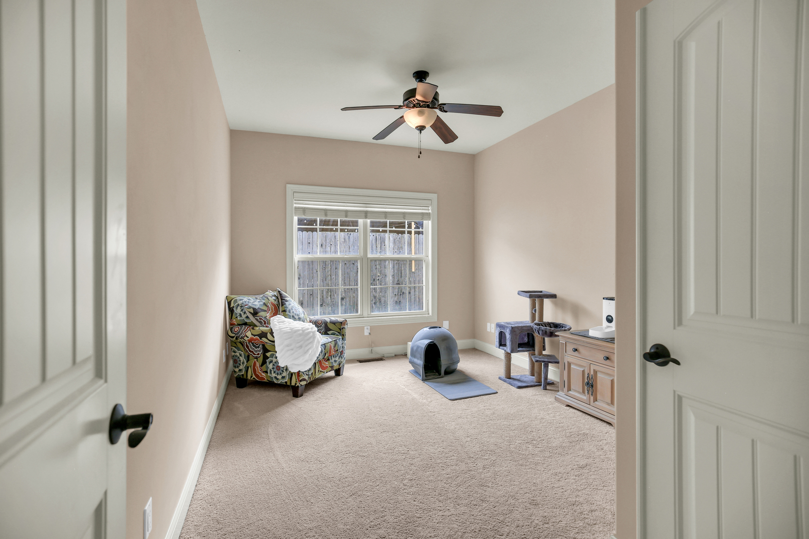 1504 Stonebluff Court, Unit 1504 Champaign, IL 61822 - Photo 25 of 40 a bed room with furniture and a window